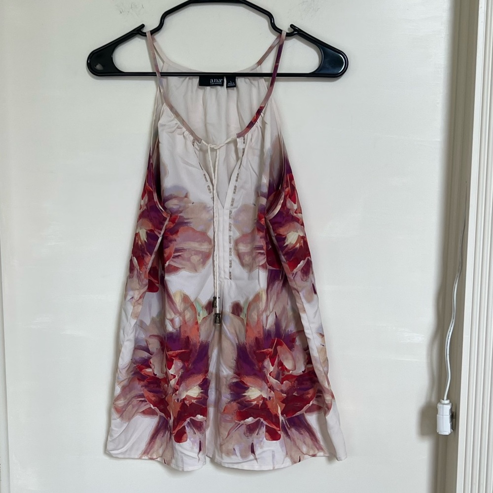 White with pink floral sleeveless blouse